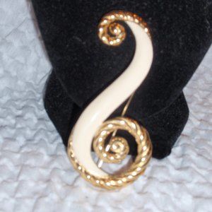 Vintage Trifari Off white and gold S brooch signed.